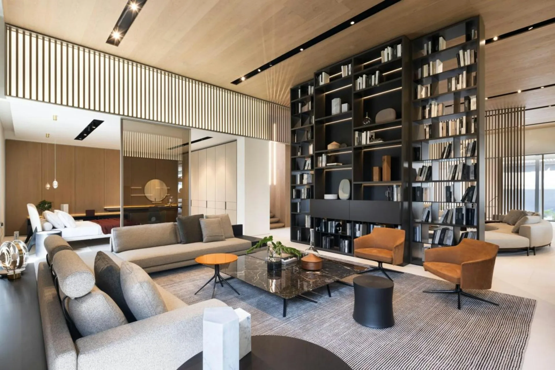 Modern kitchen with wood cabinets and black shelving.